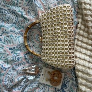 Elegant Cream Woven Handbag with Bamboo Handle